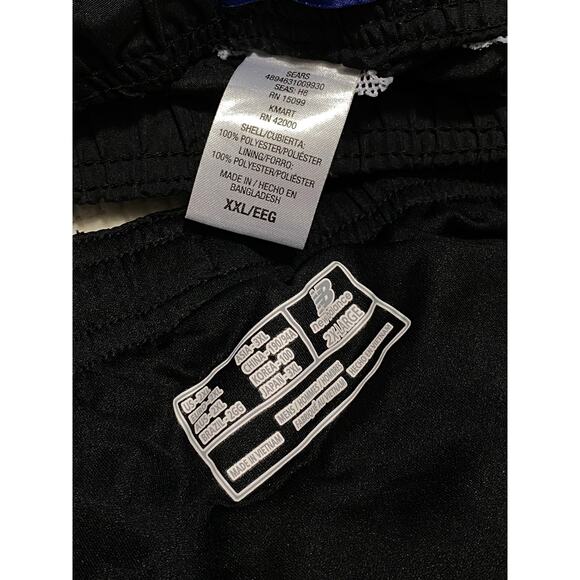 4 Pairs of Black work out shorts size XL and 2XL= all fit similar- 1 New Balance - Picture 2 of 4